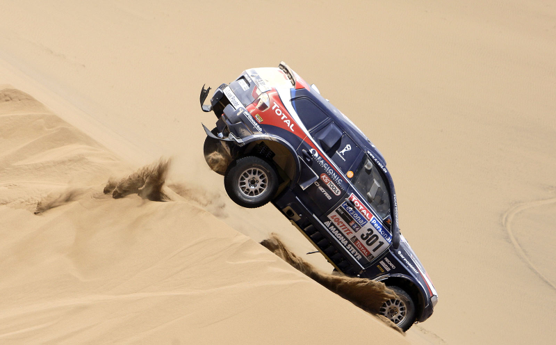 Illustration for article titled Dakar Rally: A Racing Photographer's Wet Dream